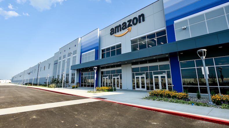 A lot of job growth in the late fall is in logistics, the handling and delivery of packages for the holidays. NICK GRAHAM/STAFF