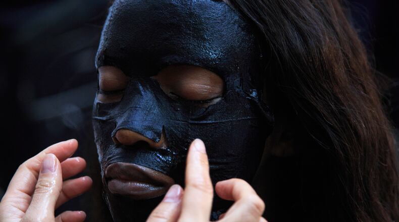 NEW YORK, NY - FEBRUARY 17: A model uses Dr. Jart+ skincare during Dr. Jart+ for DKNY Fall/Winter 2016 Show at Skylight Modern on February 17, 2016 in New York City. (Photo by Anna Webber/Getty Images for Dr. Jart+)