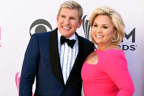 Julie Chrisley (right) and her husband Todd Chrisley, seen here in 2017. (Jordan Strauss/Invision/AP)