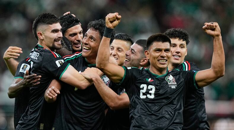 Mexico's Luis Romo, third left, celebrates with his teammates after scoring g his team's first goal during the World Cup Group A soccer match between Mexico and South Korea in Zapopan, near Guadalajara, Mexico, Thursday, June 18, 2026. (AP Photo/Natacha Pisarenko)