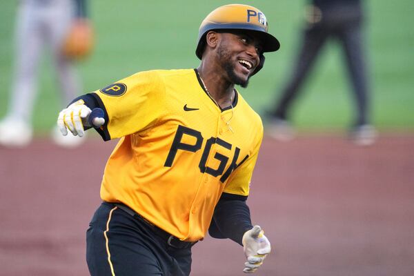 Pittsburgh Pirates' Alexander Canario celebrates as he rounds third after hitting a solo home run off Atlanta Braves pitcher Bryce Elder during the third inning of a baseball game in Pittsburgh, Friday, May 9, 2025. (AP Photo/Gene J. Puskar)