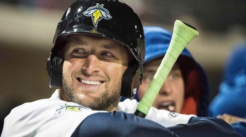In April 6, 2017, file photo, Columbia Fireflies outfielder Tim Tebow smiles during a Class A minor league baseball game against the Augusta GreenJackets in Columbia, S.C. Tebow showed some consistency at the plate this week with two multi-hit games for the Fireflies. (AP Photo/Sean Rayford, File)