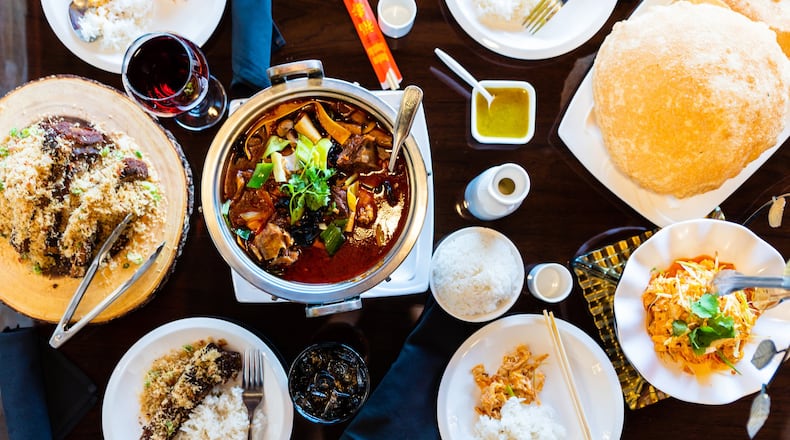 A full table at Fire Stone Chinese in Kennesaw. CONTRIBUTED BY HENRI HOLLIS
