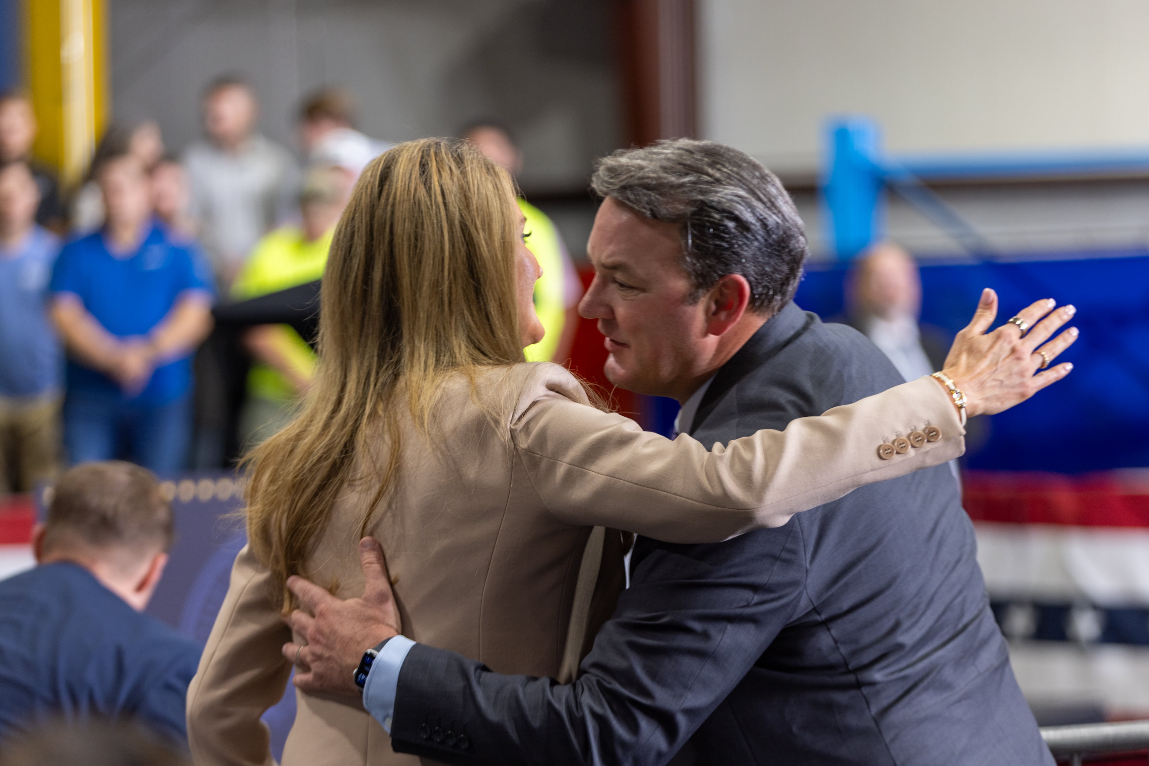 United States Administrator of the Small Business Administration Kelly Loeffler and Lt. Gov. Burt Jones hug before Vice President JD Vance appears at ALTA Refrigeration in Peachtree City on Thursday, August 21, 2025. (Arvin Temkar / AJC)