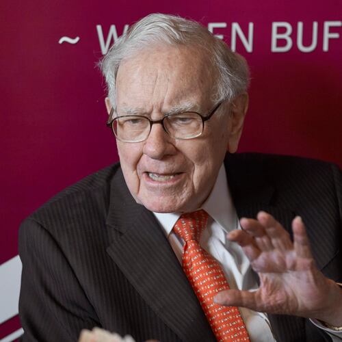 FILE - Warren Buffett, Chairman and CEO of Berkshire Hathaway, speaks during a game of bridge following the annual Berkshire Hathaway shareholders meeting May 5, 2019, in Omaha, Neb. (AP Photo/Nati Harnik, File)