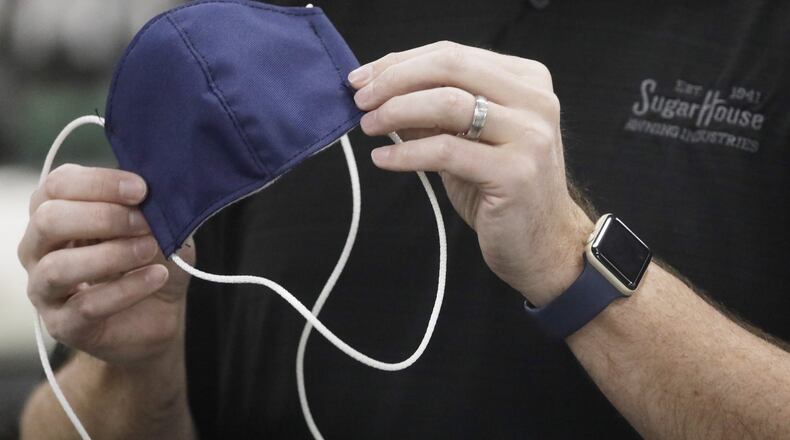 A face mask is shown at SugarHouse Industries Thursday, March 26, 2020, in Midvale, Utah. SugarHouse Industries, a Utah company that usually manufactures boat tops and covers, has reconfigured its operation amid the spread of the coronavirus to produce face shields and masks. (AP Photo/Rick Bowmer)