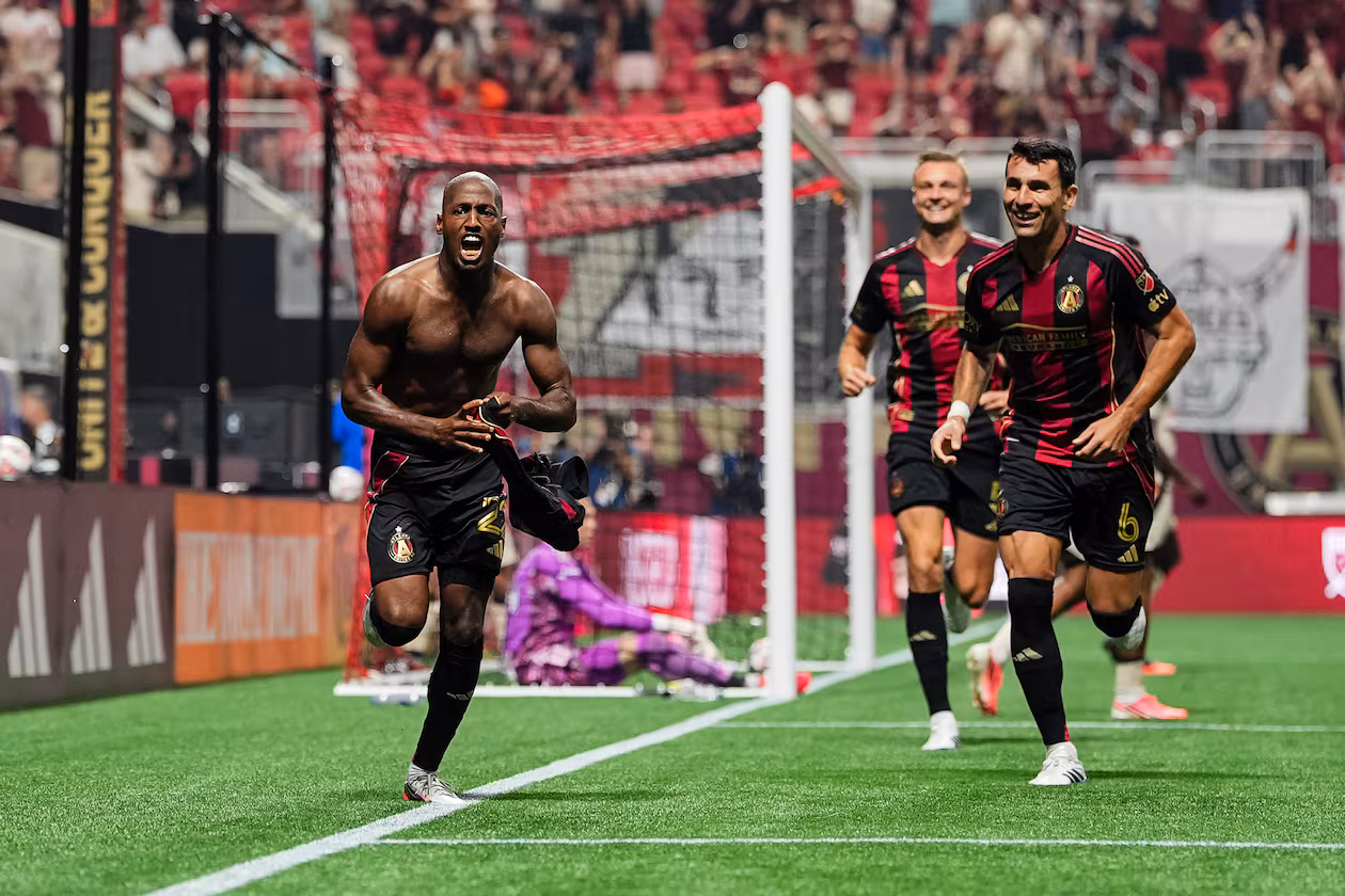 Atlanta United forward Fafà Picault (left celebrates after scoring the game-winner in the 82nd miniute against Red Bull New York on Saturday, Aug. 15, 2026, at Mercedes-Benz Stadium in Atlanta. (Courtesy of Mitch Martin/Atlanta United)