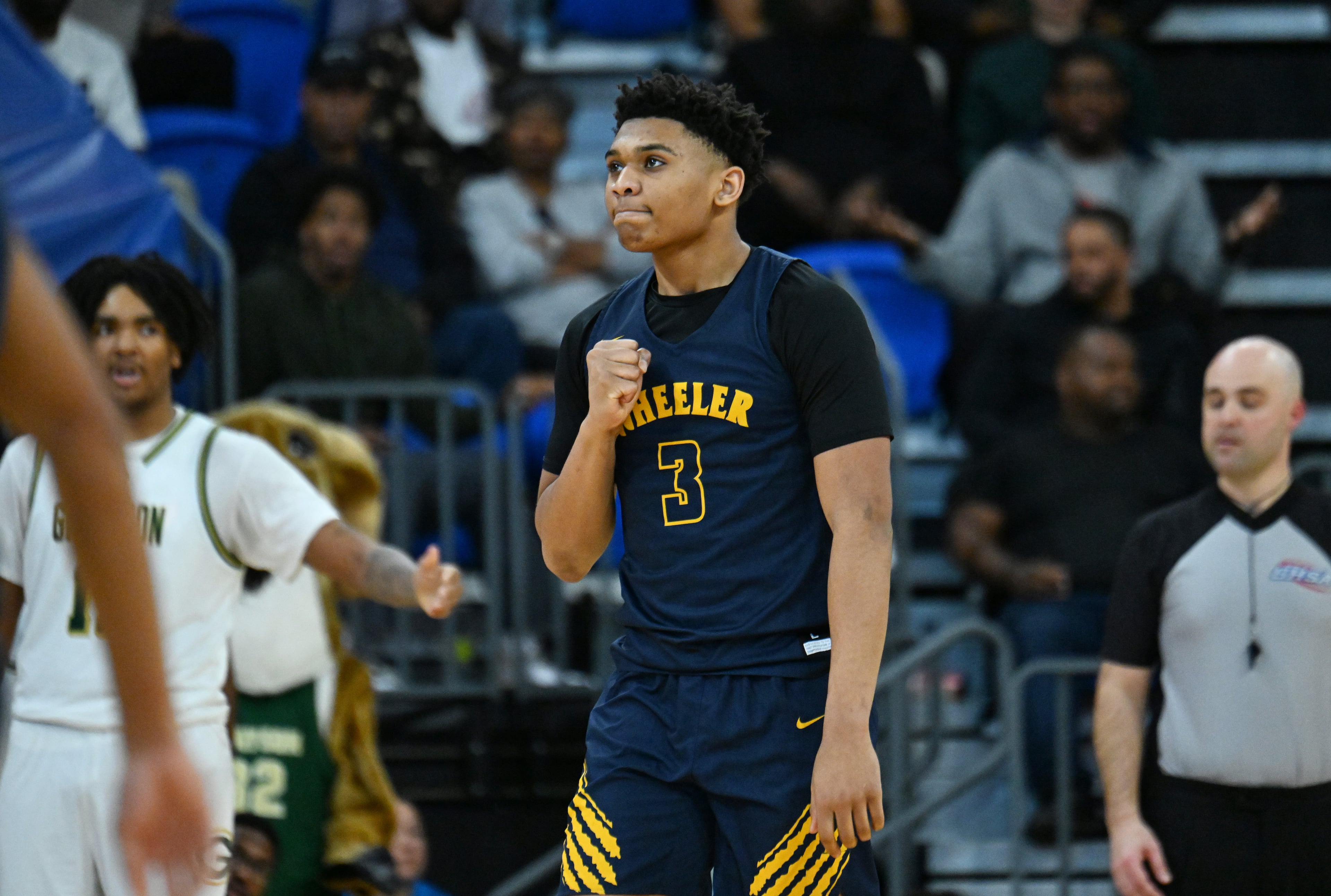 Wheeler's Colben Landrew reacts during the second half of the GHSA Class 6A Boys State Basketball playoffs game at the Georgia State Convocation Center, Saturday, March 1, 2025, in Atlanta. Wheeler won 68-53 over Grayson. (Hyosub Shin/AJC)