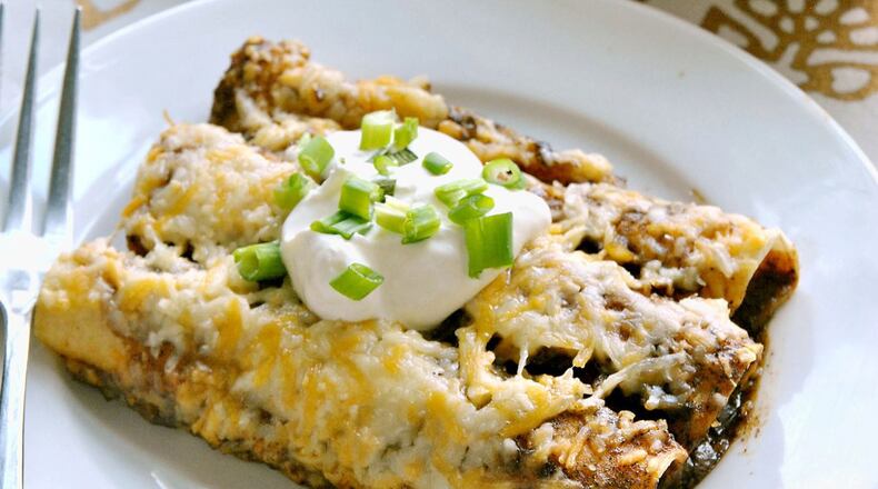 Cheese Enchiladas with Chili Gravy. (Gretchen McKay/Pittsburgh Post-Gazette/TNS)