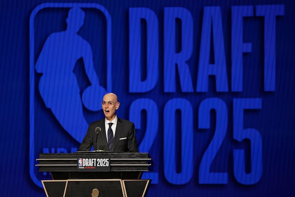 NBA commissioner Adam Silver announces the start of the first round of the NBA basketball draft, Wednesday, June 25, 2025, in New York. (AP Photo/Adam Hunger)