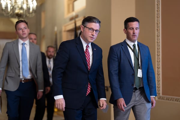 Speaker of the House Mike Johnson, R-La., center, arrives for a closed-door Republican meeting to advance President Donald Trump's sweeping domestic policy bill, at the Capitol in Washington, Friday, June 27, 2025. (AP Photo/J. Scott Applewhite)