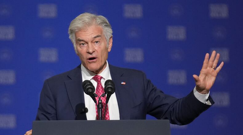 Centers for Medicare & Medicaid Services administrator Dr. Mehmet Oz speaks before Vice President JD Vance at the Wisconsin Air National Guard facility at Milwaukee Mitchell International Airport, Wednesday, July 8, 2026, in Milwaukee. (AP Photo/Mark Schiefelbein, Pool)