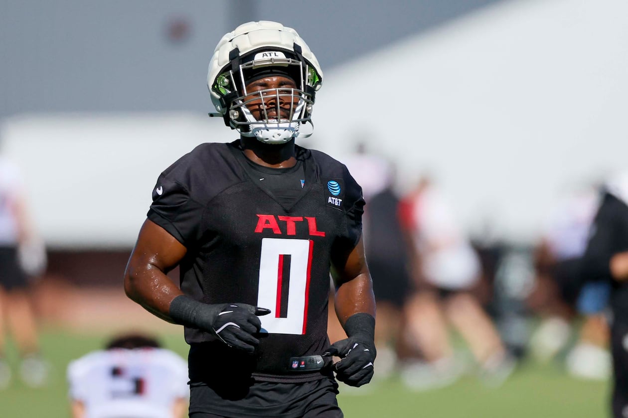 Falcons linebacker Divine Deablo — pictured during training camp in July — will take over communicating the plays on defense, just one of the many roles that Kaden Elliss played last season. (Miguel Martinez/AJC)