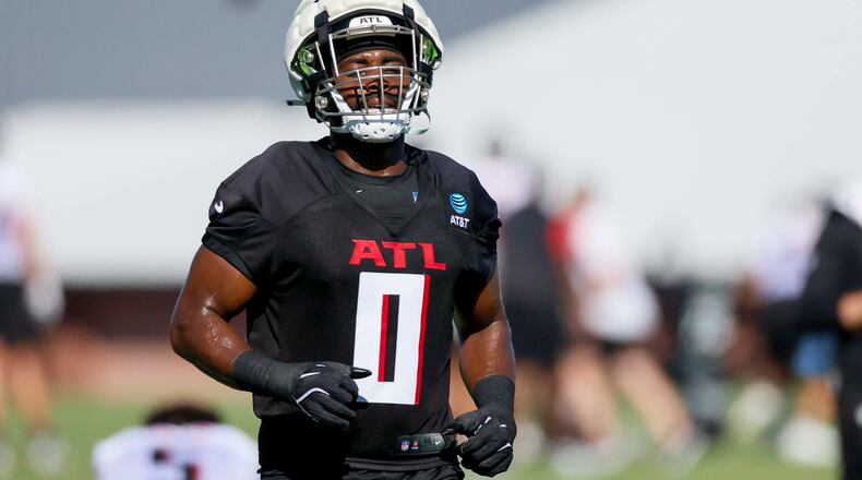 Falcons linebacker Divine Deablo — pictured during training camp in July — will take over communicating the plays on defense, just one of the many roles that Kaden Elliss played last season. (Miguel Martinez/AJC)