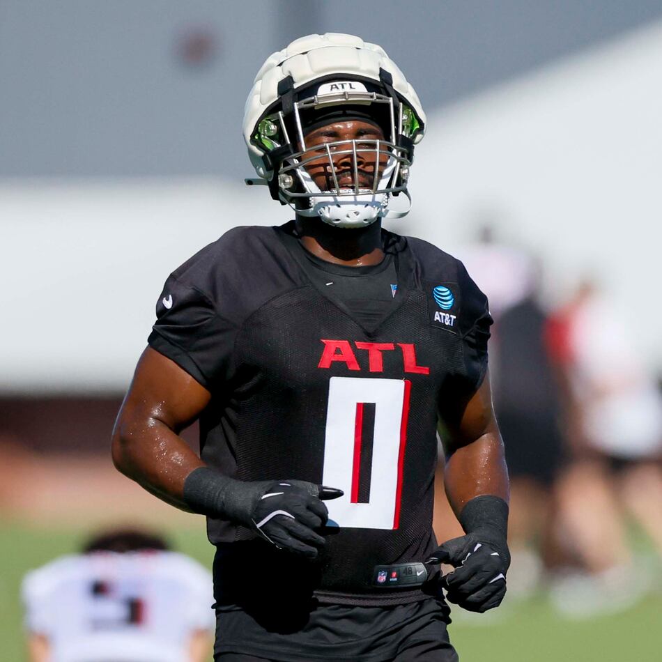 Falcons linebacker Divine Deablo — pictured during training camp in July — will take over communicating the plays on defense, just one of the many roles that Kaden Elliss played last season. (Miguel Martinez/AJC)