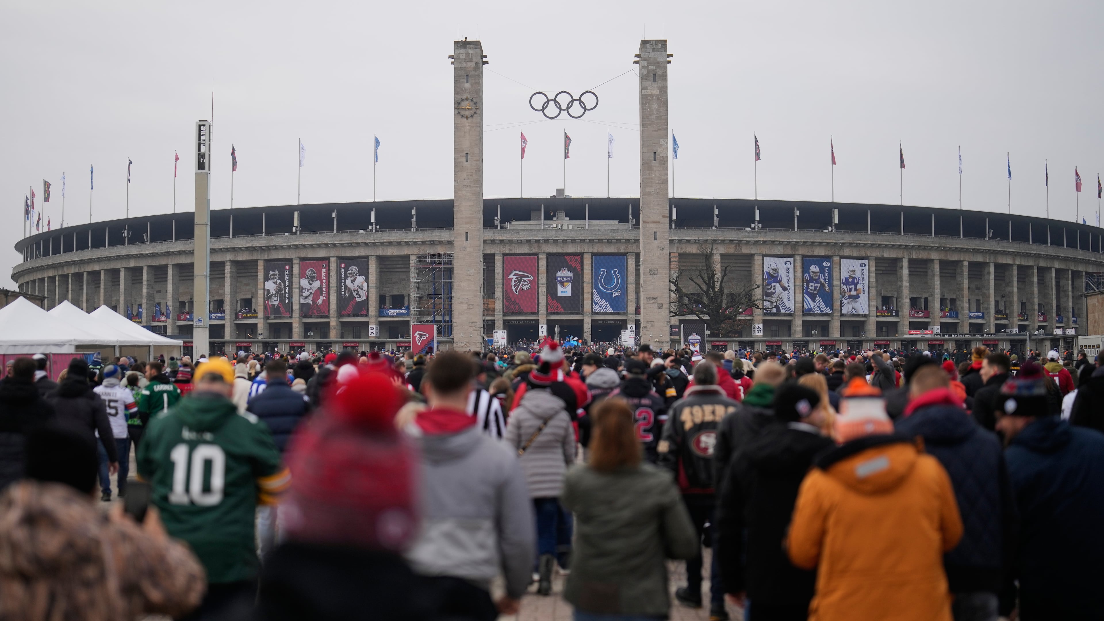 Supporters arrive at the Olympic stadium for the NFL game between the Indianapolis Colts and the Atlanta Falcons in Berlin, Germany, Sunday, Nov. 9, 2025. (Markus Schreiber/AP)