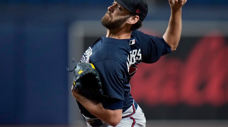 Atlanta Braves pitcher Ian Anderson delivers to the Tampa Bay Rays during the first inning of a spring training baseball game Friday, March 10, 2023, in St. Petersburg, Fla. (AP Photo/Chris O'Meara)