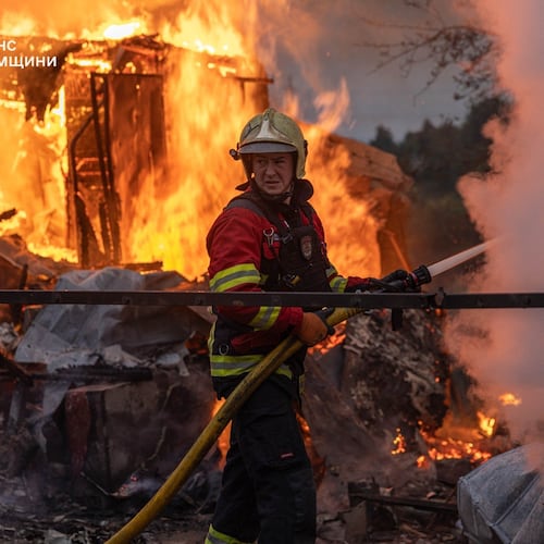 In this photo provided by the Ukrainian Emergency Service, firefighters put out a fire at private homes following a Russian air attack in Sumy, Ukraine, Wednesday, Sept. 16, 2026. (Ukrainian Emergency Service via AP)