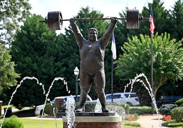 Jerry McKenna was a teenage weightlifter when he saw Paul Anderson lift at an auditorium in Cleveland, Ohio in the spring of 1955. Decades later, McKenna created the sculpture of Anderson that stands in Toccoa, Georgia. (Hyosub Shin/AJC)
