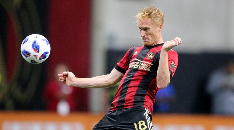 Atlanta United midfielder Jeff Larentowicz blocks a pass while defending against the New York Red Bulls during the first half in a MLS soccer match on Sunday, May 20, 2018, in Atlanta. Curtis Compton/ccompton@ajc.com