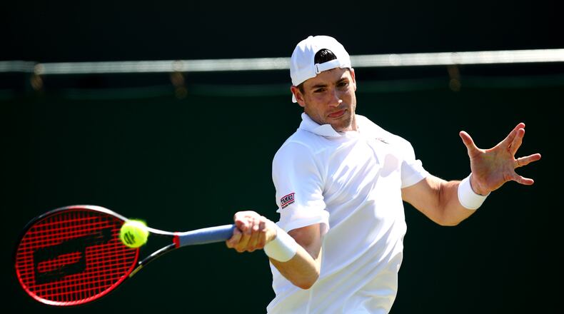LONDON, ENGLAND - JULY 04: John Isner of The United States plays a forehand in his Men's Singles second round match against Mikhail Kukushkin of Kazakhstan during Day four of The Championships - Wimbledon 2019 at All England Lawn Tennis and Croquet Club on July 04, 2019 in London, England. (Photo by Clive Brunskill/Getty Images)