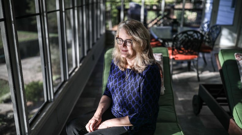 Paula Robin, a former Republican who considers herself an independent now, poses for a portrait at her home in East Cobb, Thursday, Oct. 11, 2018, in Marietta, Ga. BRANDEN CAMP/SPECIAL