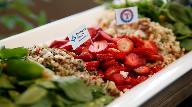 This healthy Globe Life Park salad features strawberries, quinoa, baby spinach and toasted walnuts in Arlington, Texas. (Rose Baca/Dallas Morning News/TNS)