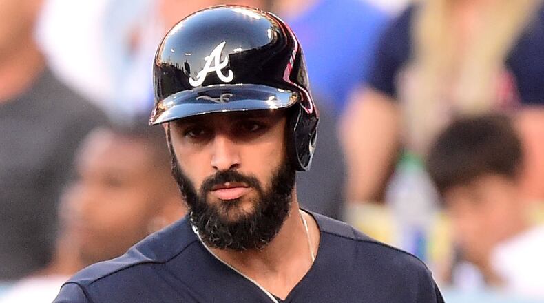 Sean Rodriguez walks toward the plate against the Los Angeles Dodgers during the first inning at Dodger Stadium on July 21, 2017 in Los Angeles.