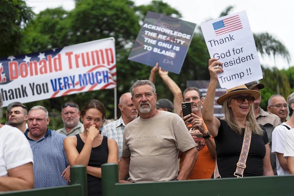 FILE - White South Africans demonstrate in support of U.S. President Donald Trump in front of the U.S. embassy in Pretoria, South Africa, Feb. 15, 2025. (AP Photo/Jerome Delay, File)