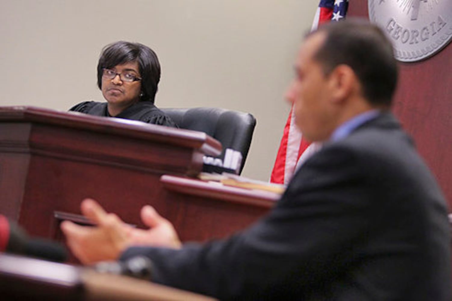 Teen in court, accused of killing cop