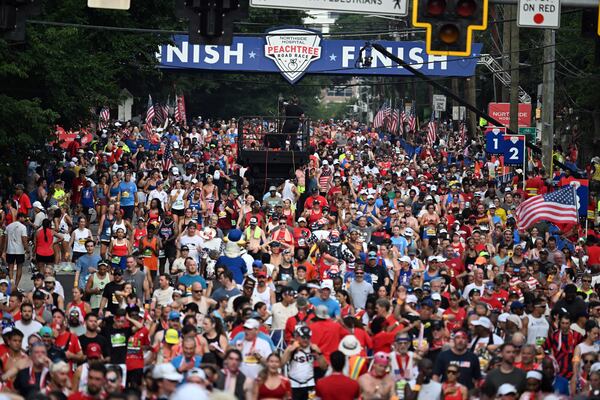 The Peachtree community turned out in full force for the 57th running of the race. (Hyosub Shin/AJC)
