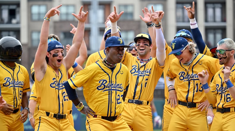 Savannah Bananas players and coaches dance during first of three-game series at Coolray Field, Saturday, March 23, 2024, in Lawrenceville. The Savannah Bananas’ visit is their first to the Atlanta area since their founding in 2016. The team is based in their namesake Georgia city and plays 30-plus games a year at Historic Grayson Stadium, a century-old ballpark on Savannah’s eastside. (Hyosub Shin / Hyosub.Shin@ajc.com)