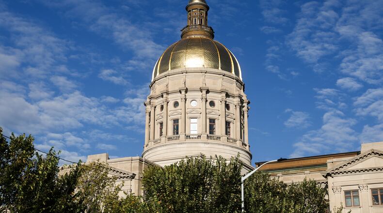Sun shines on the Georgia State Capitol in Atlanta, Oct. 1, 2025. Both major parties agree that rising costs will be a big campaign issue but they disagree on how to tackle it. (Abbey Cutrer/AJC)