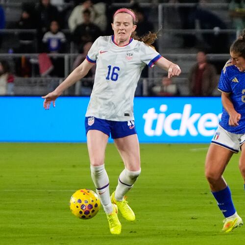 FILE - United States midfielder Rose Lavelle (16) stops Italy defender Valentina Bergamaschi (2) from advancing the ball during the first half of an international friendly soccer match Friday, Nov. 28, 2025, in Orlando, Fla. (AP Photo/John Raoux, File)