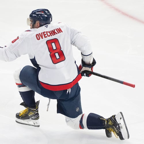 Washington Capitals' Alex Ovechkin reacts following his goal over the Montreal Canadiens during first-period NHL hockey game action in Montreal, Thursday, Nov. 20, 2025. (Christinne Muschi/The Canadian Press via AP)