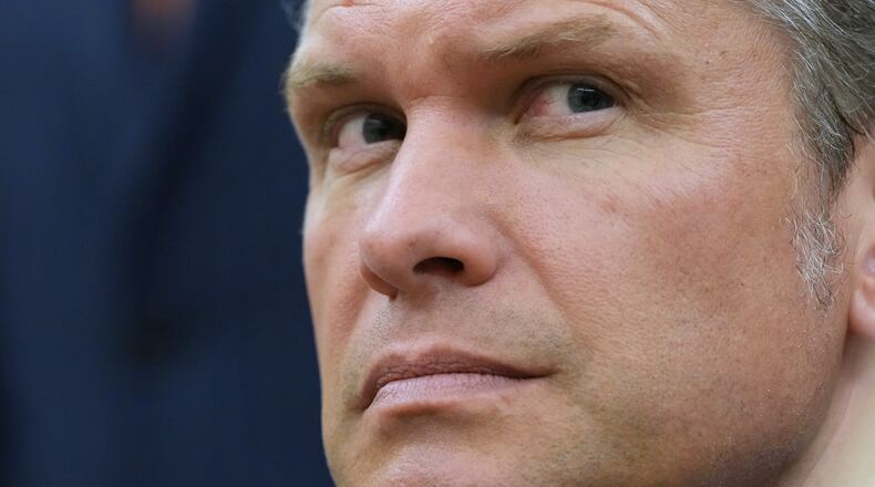 Secretary of Defense Pete Hegseth listens as President Donald Trump meets with Iraq's Prime Minister Ali al-Zaidi in the Oval Office of the White House, Tuesday, July 14, 2026, in Washington. (AP Photo/Julia Demaree Nikhinson)