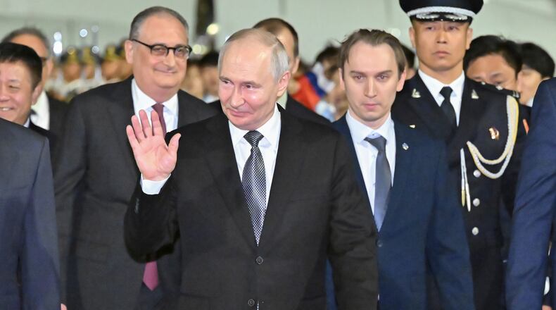 In this photo released by Xinhua News Agency, Russian President Vladimir Putin arrives for a state visit in Beijing on Tuesday, May 19, 2026. (Gao Jie/Xinhua via AP)