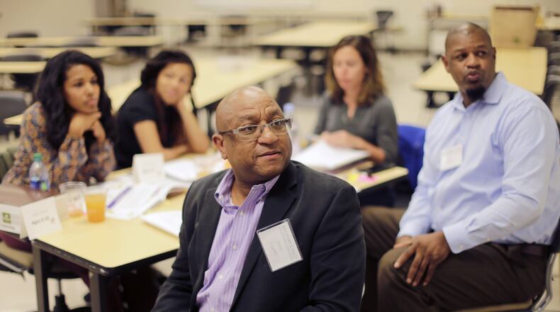 Nov. 8, 2016, Atlanta — Johnny DiBartolo (front) and other educators and counselors participate in an interactive course through the Military Child Education Coalition (MCEC). The course created an environment for educators, professionals and parents to learn about the unique issues children face when their parents voluntarily or involuntarily transition from military to civilian life. BOB ANDRES/ BANDRES@AJC.COM