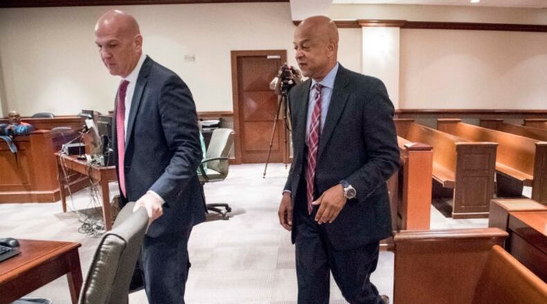 DeKalb County Sheriff Jeff Mann, right, with his attorney, Noah Pines, pleaded not guilty to charges of indecency and obstruction in Atlanta Municipal Court on Friday, June 2. JOHN AMIS / AJC