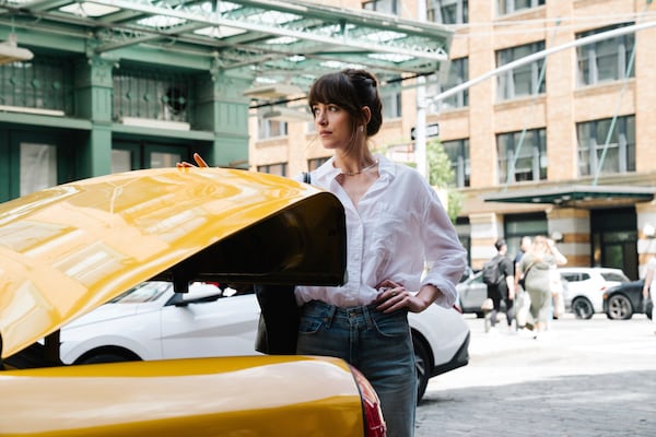 This image released by A24 shows Dakota Johnson in a scene from "Materialists." (A24 via AP)