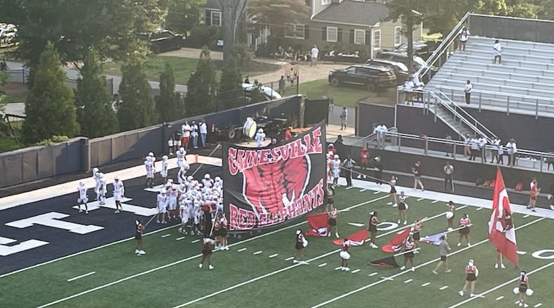 Gainesville players prepare to take the field before their season-opening game against Marietta at Northcutt Stadium on Aug. 16, 2024.