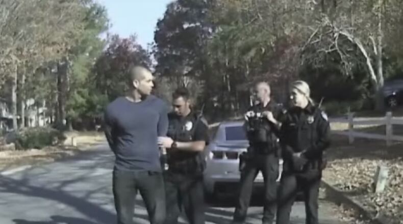 Jade Pearson is seen on police dashcam video as he is arrested on a charge of aggressive driving. (Credit: Channel 2 Action News)