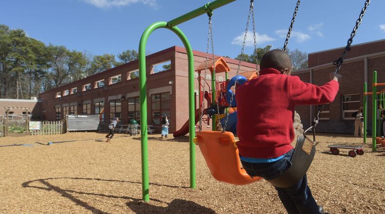 FEBRUARY 24, 2017 ATLANTA Students in Lisa Cunnigham’s second grade class play during a recess at the Burgess-Peterson Academy. Kent D. Johnson/AJC