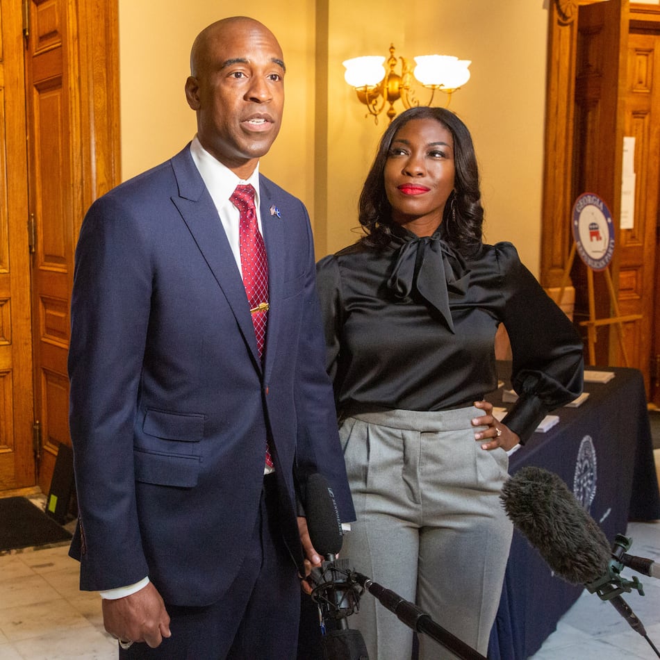 Kelvin and Janelle King talk with the press at the state Capitol, Tuesday, March 8, 2022, at the Georgia State Capitol. (Steve Schaefer for the AJC)