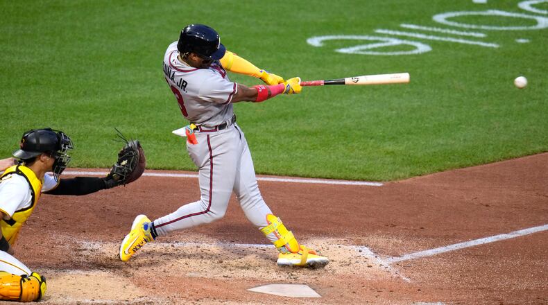 Atlanta Braves' Ronald Acuña Jr. hits an RBI double off Pittsburgh Pirates starting pitcher Quinn Priester during the fourth inning of a baseball game in Pittsburgh, Wednesday, Aug. 9, 2023. (AP Photo/Gene J. Puskar)