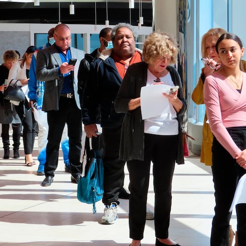 FILE - Applicants line up at a job fair at the Ocean Casino Resort in Atlantic City N.J., on April 11, 2022. (AP Photo/Wayne Parry, File)