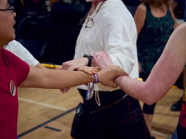 Dancers come together in a star formation during a contra dance (Courtesy of Dave Pokorney)