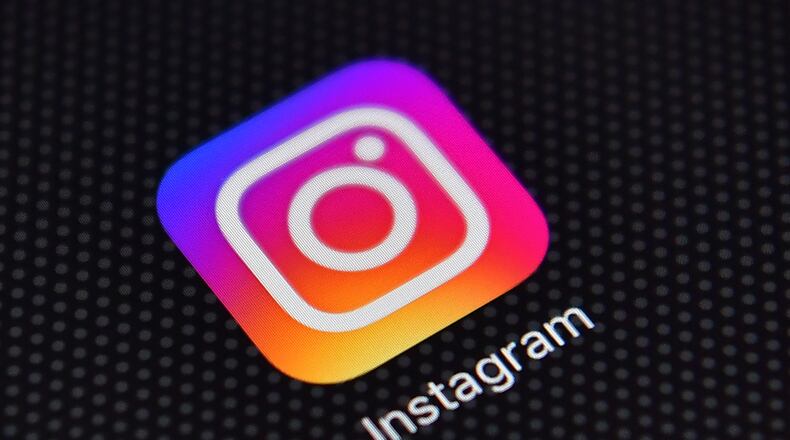 LONDON, ENGLAND - AUGUST 03: The Instagram app logo is displayed on an iPhone on August 3, 2016 in London, England. (Photo by Carl Court/Getty Images)