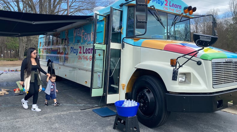 A school bus outfitted with toys, games and other educational resources will travel throughout Gwinnett County to bring learning experiences to families. (Josh Reyes / josh.reyes@ajc.com)