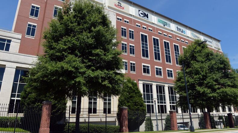 A building at Turner’s campus in Midtown Atlanta. Now owned by New York-based Time Warner, Turner properties would become part of AT&T under a proposed deal. KDJOHNSON/KDJOHNSON@AJC.COM